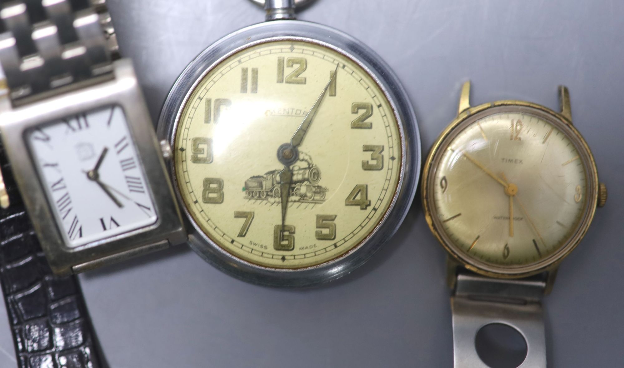 Seven assorted wrist watches including two Timex and an Omnia and two pocket watches.